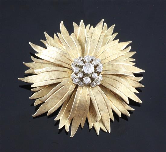 A Hungarian textured 14ct gold and diamond set flower head brooch, 2in.